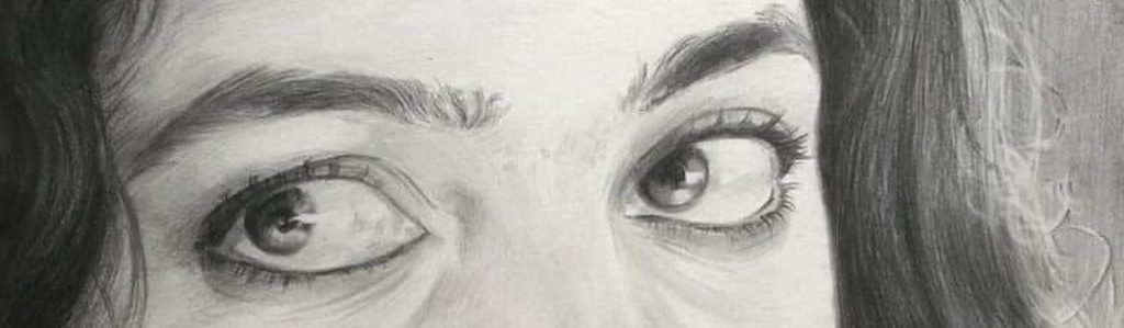 Pencil drawing just face and eyebrow of a girl in black and white representing traditional pencil drawing