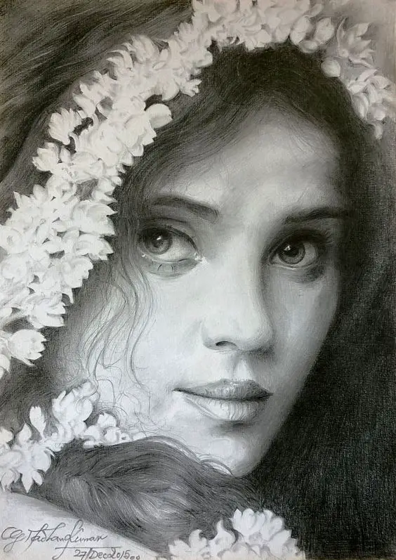 Pencil portrait of a beautiful girl, with flowers on her hair. 