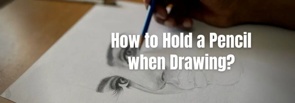 A person drawing a female face with pencil showing how to hold a pencil when drawing