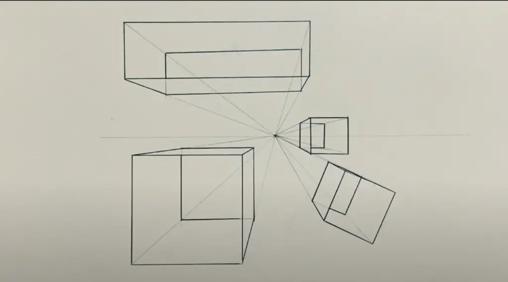 Three Cubes and a Box drawn with Pencil and corners converging to the Vanishing Point