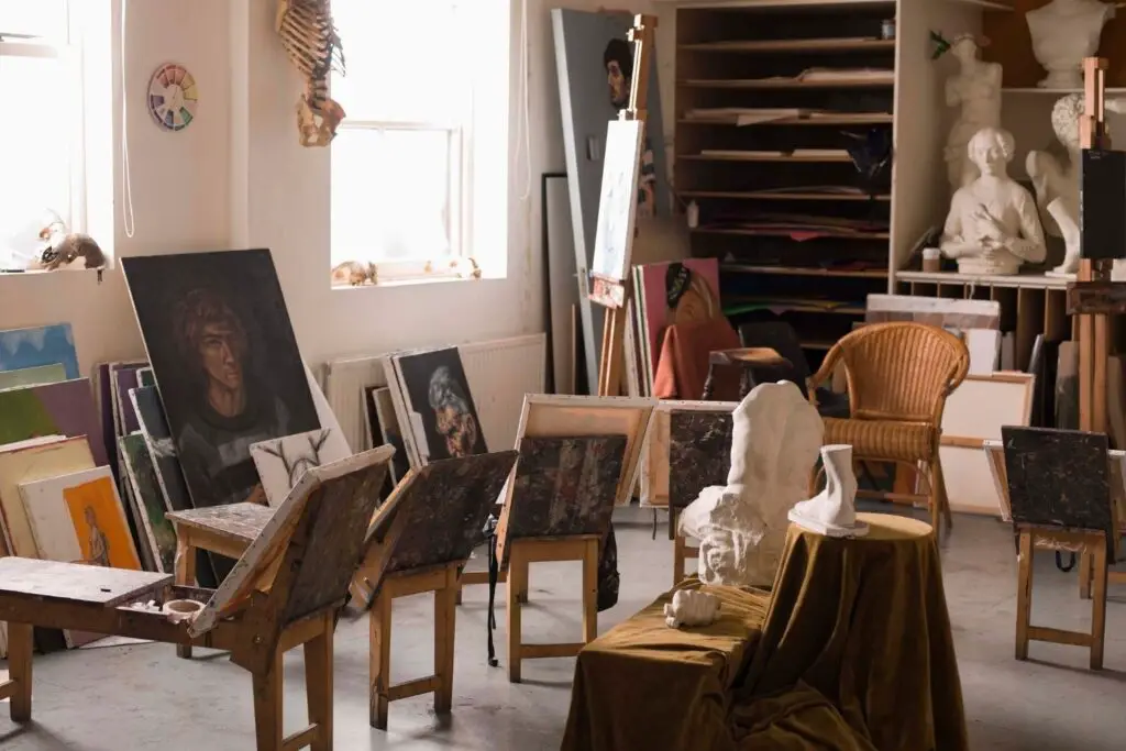 Art studio with paintings, sculptures andpaints